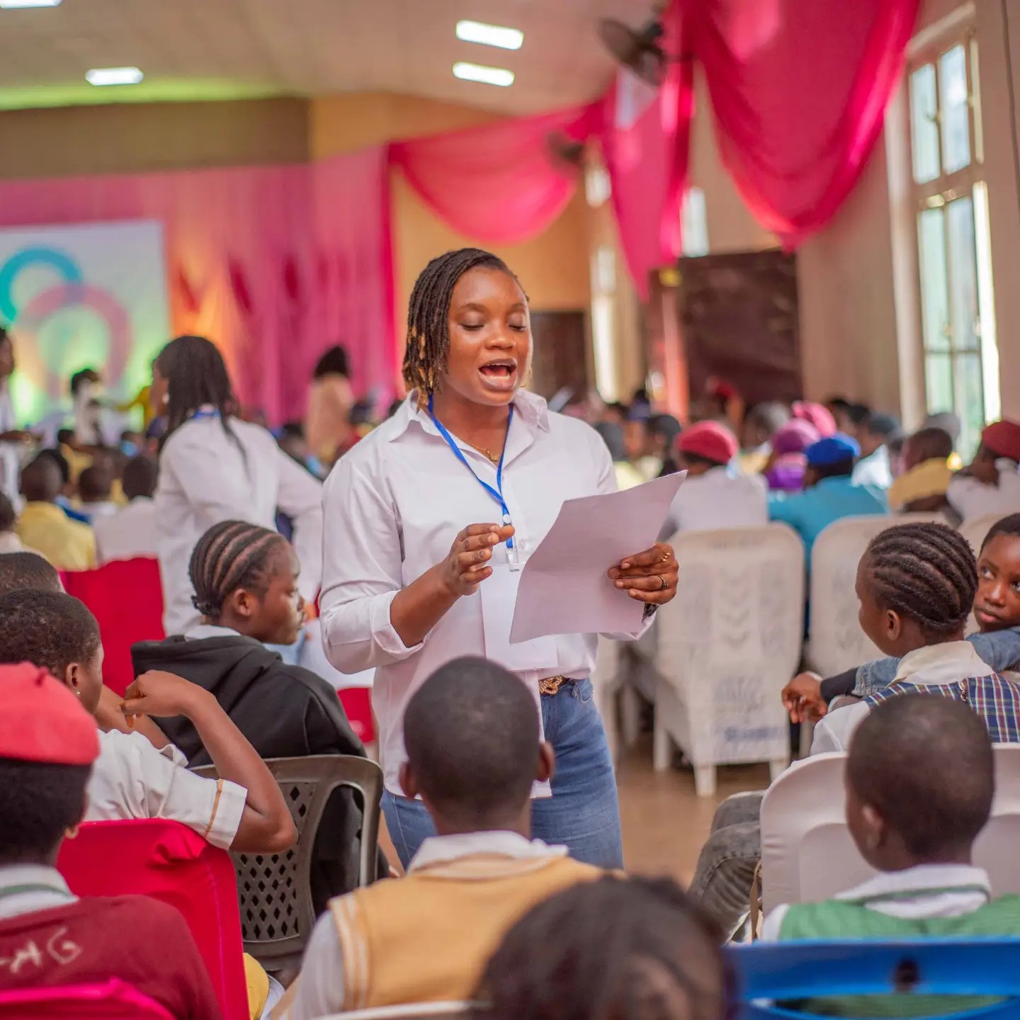 A student contributing to a conversation at the Peerless gathering